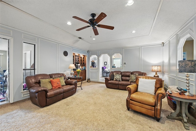 2606 N Carroll Ave, Southlake, TX 76092 - carpeted living room featuring a decorative wall, a ceiling fan, arched walkways, and recessed lighting