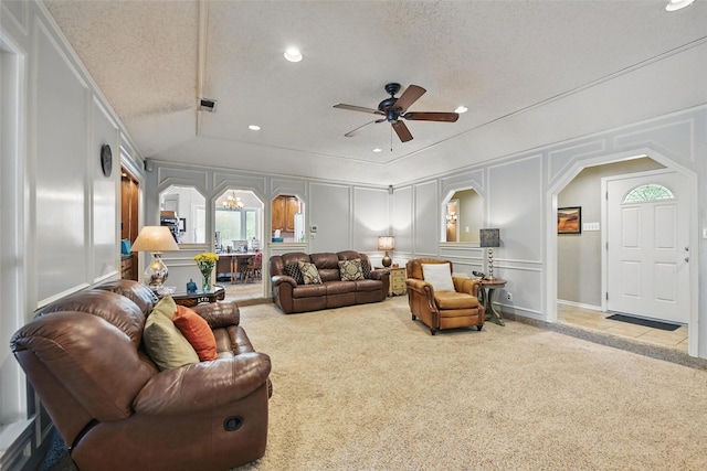 2606 N Carroll Ave, Southlake, TX 76092 - living area with a decorative wall, arched walkways, carpet floors, a ceiling fan, and recessed lighting