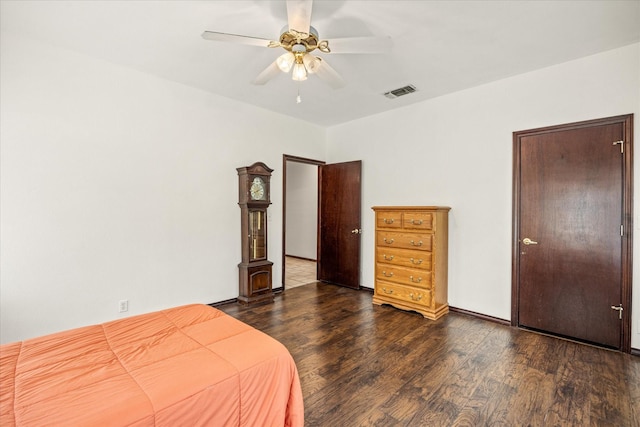 bedroom with wood finished floors and a ceiling fan