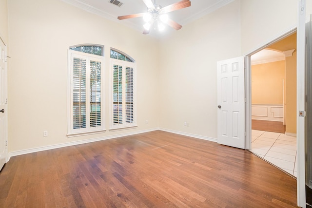 842 Turquoise Pt, Rockwall, TX 75032 - unfurnished room featuring ornamental molding, ceiling fan, wood finished floors, and baseboards