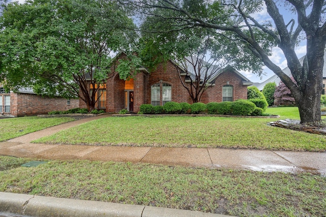 842 Turquoise Pt, Rockwall, TX 75032 - view of front of house with brick siding and a front lawn