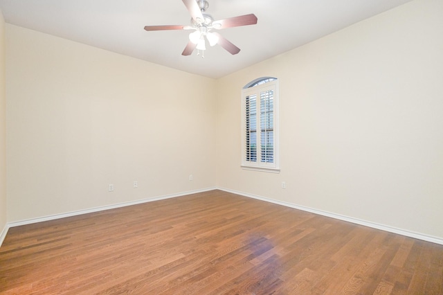 842 Turquoise Pt, Rockwall, TX 75032 - spare room featuring wood finished floors, baseboards, and a ceiling fan