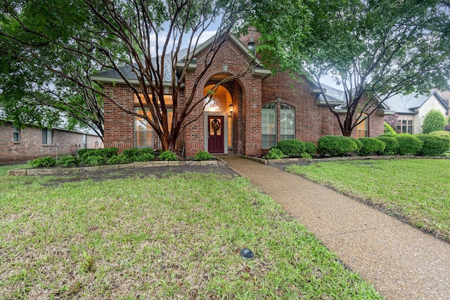 842 Turquoise Pt, Rockwall, TX 75032 - view of front of home with brick siding and a front lawn
