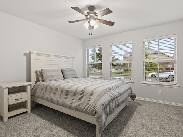 1713 Victoria Dr, Fort Worth, TX 76131 - carpeted bedroom with baseboards and a ceiling fan