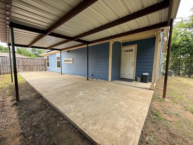 1253 E Ramsey Ave, Fort Worth, TX 76104 - view of patio / terrace featuring fence and an attached carport
