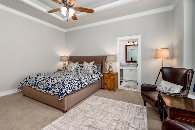 carpeted bedroom featuring ensuite bathroom and a ceiling fan
