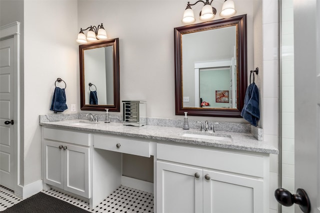 bathroom featuring double vanity