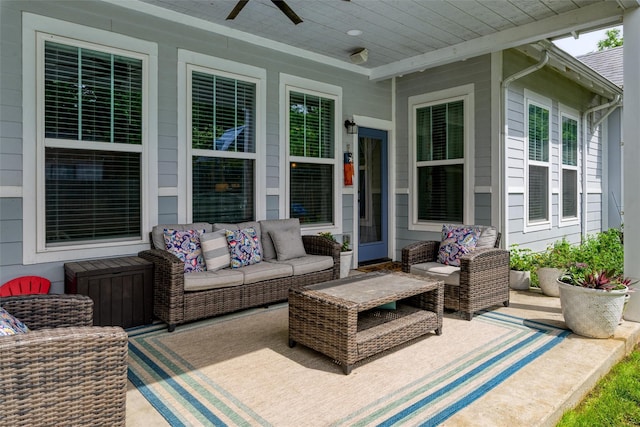 view of patio with a ceiling fan and outdoor lounge area