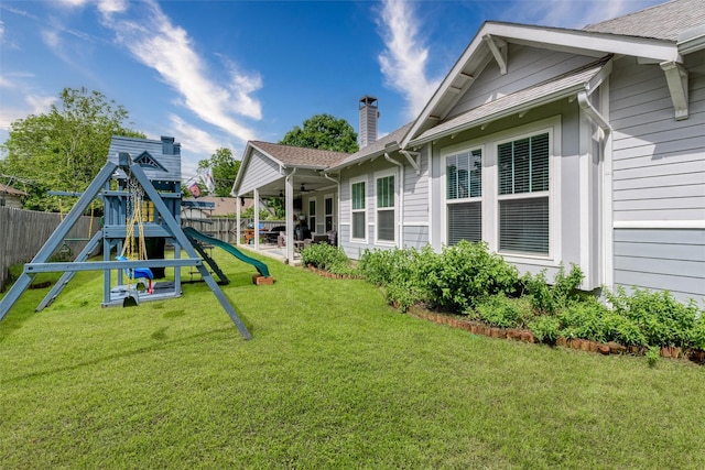 view of jungle gym featuring ceiling fan and a patio
