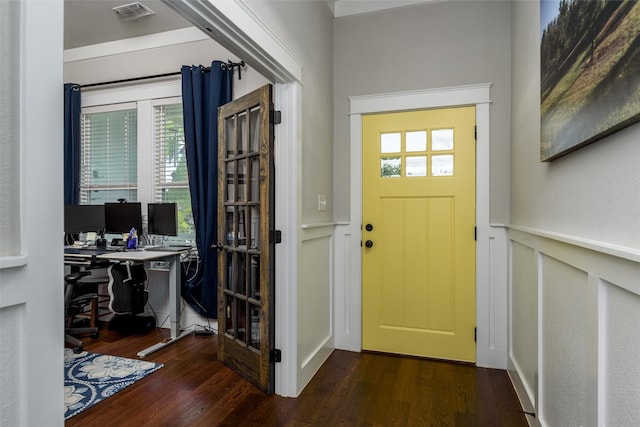 foyer featuring wood finished floors and healthy amount of natural light