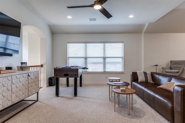 7333 Valencia Grove Ct, Fort Worth, TX 76132 - carpeted living area with ceiling fan, recessed lighting, arched walkways, and baseboards
