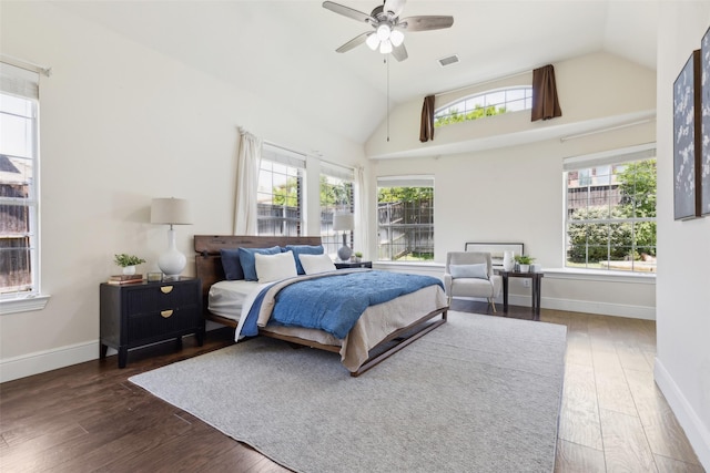 509 Wentworth Ln, Murphy, TX 75094 - bedroom with multiple windows, lofted ceiling, wood finished floors, and baseboards