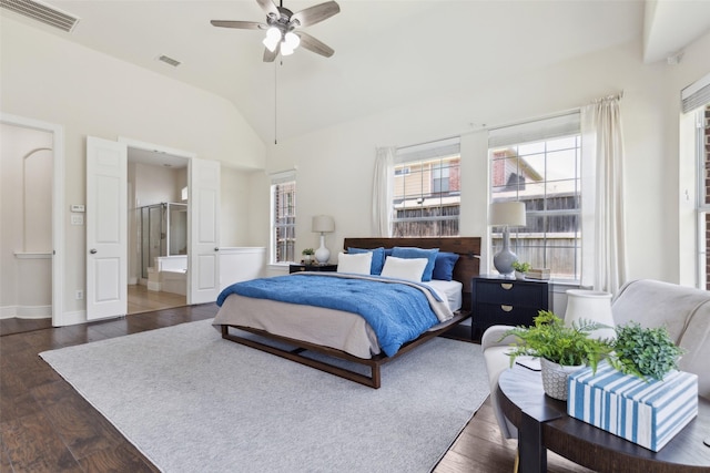 509 Wentworth Ln, Murphy, TX 75094 - bedroom featuring dark wood finished floors, vaulted ceiling, ensuite bath, and a ceiling fan