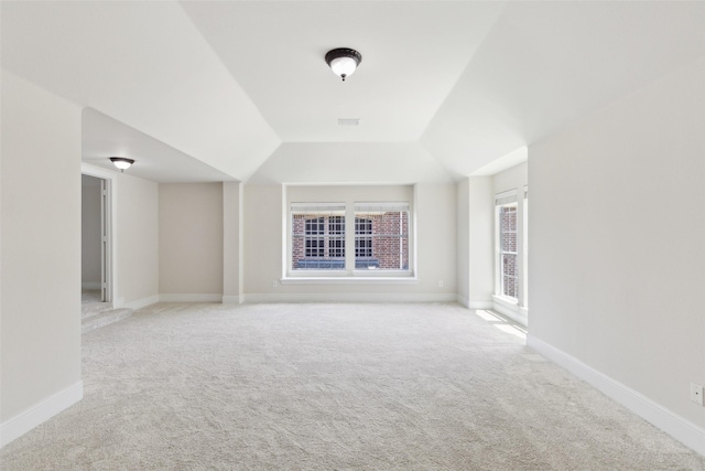 509 Wentworth Ln, Murphy, TX 75094 - carpeted spare room featuring lofted ceiling and baseboards