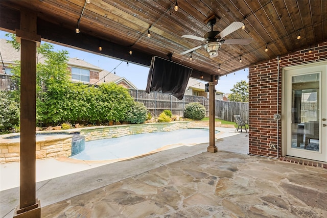 509 Wentworth Ln, Murphy, TX 75094 - view of patio featuring a fenced backyard, ceiling fan, and a pool with connected hot tub
