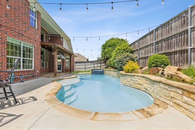 509 Wentworth Ln, Murphy, TX 75094 - view of swimming pool with a fenced backyard, a patio, and a pool with connected hot tub