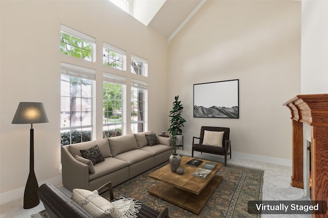 509 Wentworth Ln, Murphy, TX 75094 - carpeted living room featuring high vaulted ceiling, a fireplace with flush hearth, and baseboards