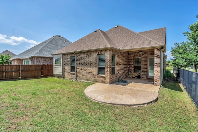 175 Calla Dr, Flower Mound, TX 75028 - back of house featuring brick siding, roof with shingles, and a patio