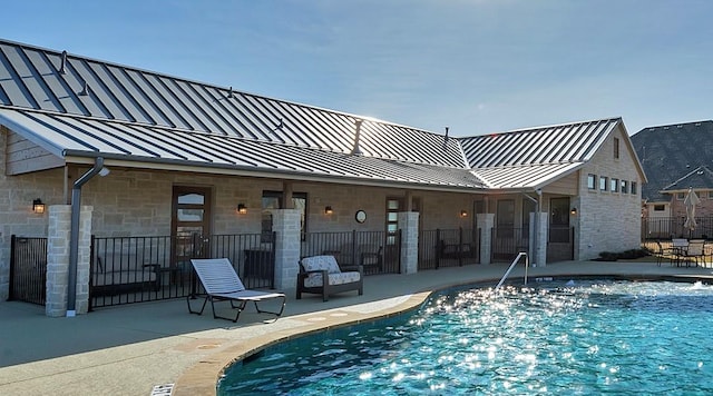 175 Calla Dr, Flower Mound, TX 75028 - community pool with a patio and fence