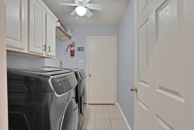 10108 Morning Glory Ln, Frisco, TX 75035 - laundry area featuring washer and dryer, cabinet space, light tile patterned floors, a ceiling fan, and baseboards