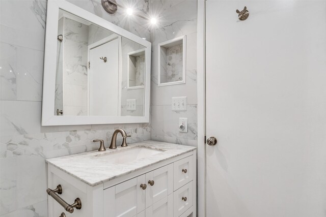 3301 Regent Dr, Plano, TX 75075 - bathroom with vanity and tile walls