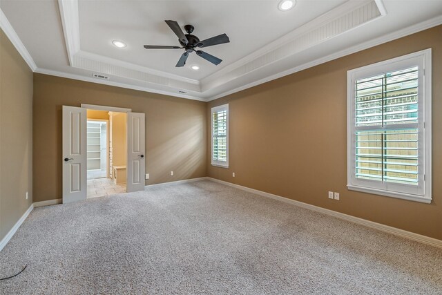 5524 Hollytree, Tyler, TX 75703 - empty room with a raised ceiling, light colored carpet, ornamental molding, a ceiling fan, and recessed lighting