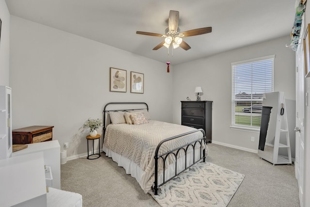 208 Beechcraft Ct, Caddo Mills, TX 75135 - bedroom with light carpet, baseboards, and ceiling fan
