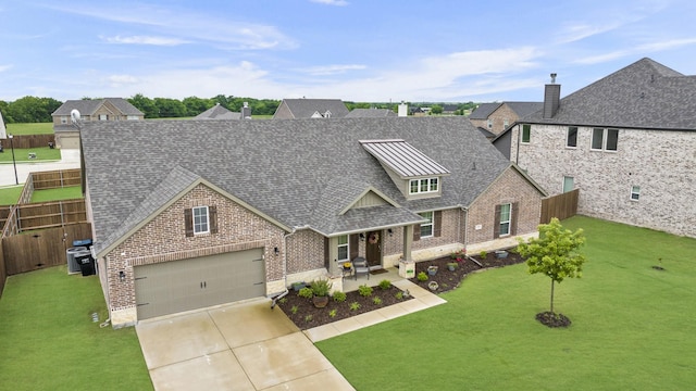 208 Beechcraft Ct, Caddo Mills, TX 75135 - view of front of property featuring brick siding, roof with shingles, concrete driveway, a standing seam roof, and a garage