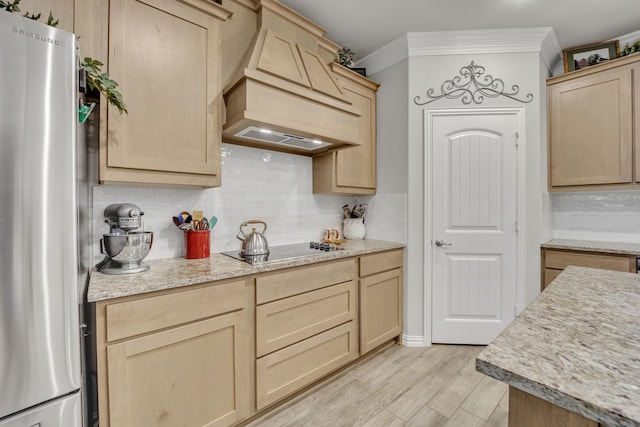 208 Beechcraft Ct, Caddo Mills, TX 75135 - kitchen featuring freestanding refrigerator, premium range hood, light brown cabinetry, and crown molding