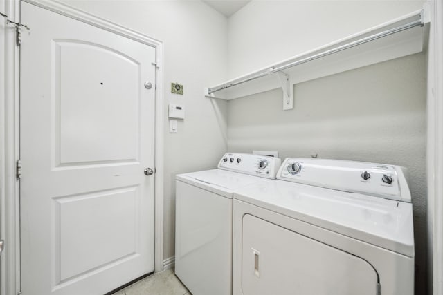 6552 Federal Hall St, Plano, TX 75023 - clothes washing area featuring washer and dryer
