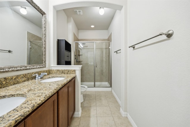 6552 Federal Hall St, Plano, TX 75023 - bathroom with a stall shower, double vanity, toilet, and tile patterned floors