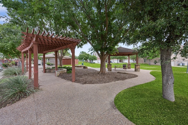 6552 Federal Hall St, Plano, TX 75023 - view of home's community with a pergola, a gazebo, and a yard
