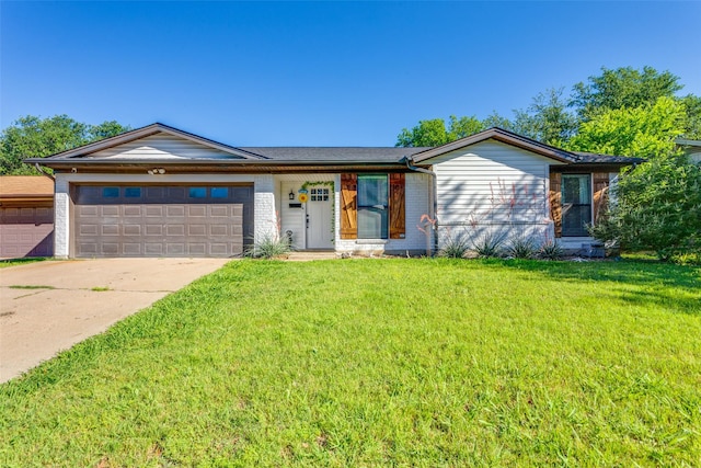 204 Laura Dr, Burleson, TX 76028 - single story home featuring an attached garage, driveway, a front yard, and brick siding