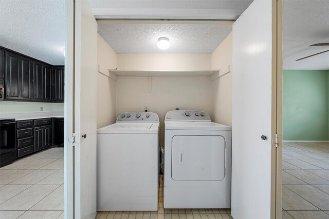 1226 Baylor Ave Unit 116, Waco, TX 76706 - laundry room featuring independent washer and dryer, a textured ceiling, light tile patterned flooring, and ceiling fan