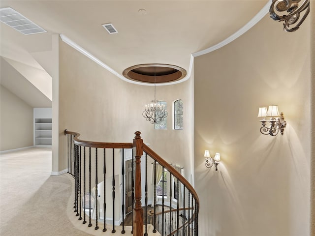 1413 Prairie Dr, Carrollton, TX 75007 - stairway featuring carpet floors, crown molding, healthy amount of natural light, a chandelier, and baseboards