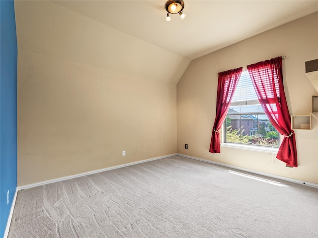 1413 Prairie Dr, Carrollton, TX 75007 - bonus room with carpet, vaulted ceiling, and baseboards
