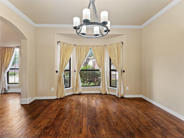 1413 Prairie Dr, Carrollton, TX 75007 - spare room with arched walkways, a chandelier, dark wood-style floors, and ornamental molding