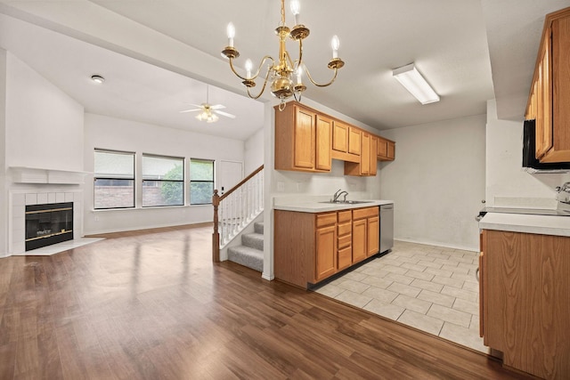 1120 Forest Creek St, Benbrook, TX 76126 - kitchen featuring dishwasher, ceiling fan, open floor plan, and light countertops