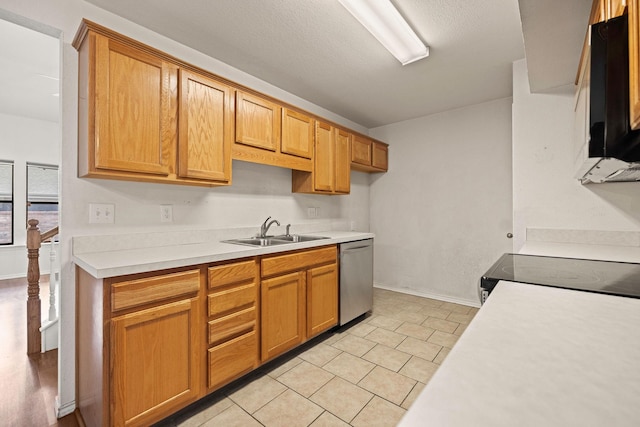 1120 Forest Creek St, Benbrook, TX 76126 - kitchen featuring dishwasher, a sink, range with electric cooktop, light countertops, and light tile patterned flooring