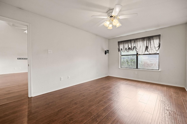 1120 Forest Creek St, Benbrook, TX 76126 - empty room with a ceiling fan, hardwood / wood-style flooring, and baseboards