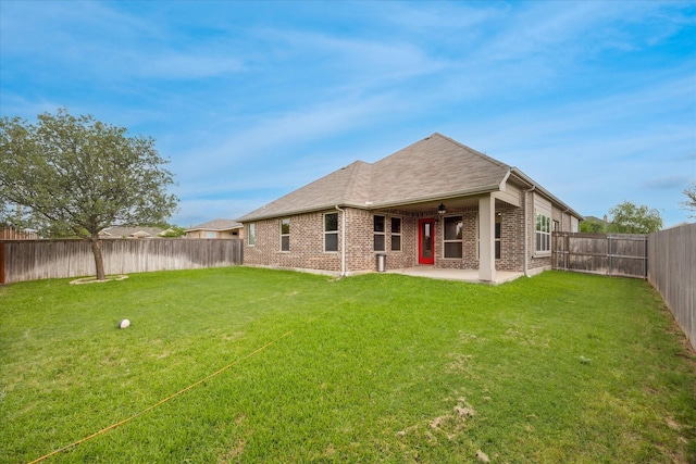 5013 Spruce, Krum, TX 76249 - rear view of property with a patio, brick siding, ceiling fan, and a shingled roof
