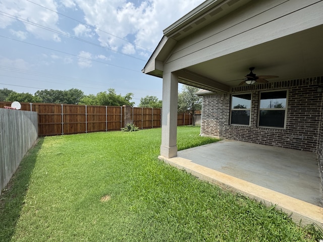5013 Spruce, Krum, TX 76249 - view of yard with ceiling fan and a patio