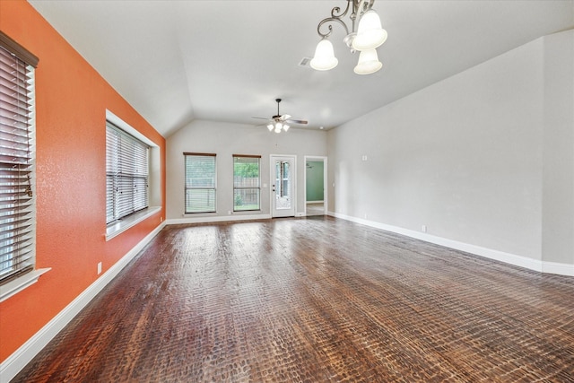 5013 Spruce, Krum, TX 76249 - unfurnished living room with a chandelier, a ceiling fan, vaulted ceiling, and baseboards