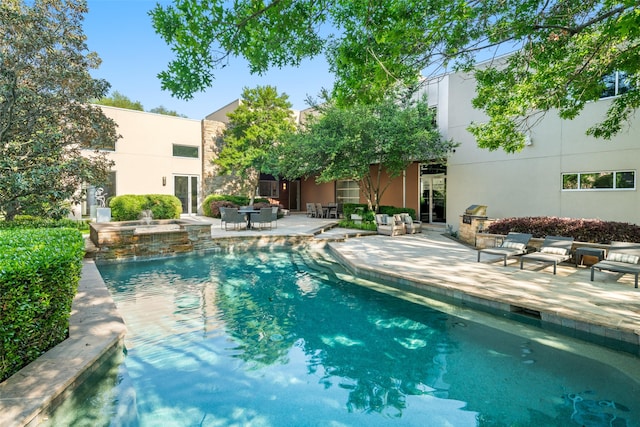 swimming pool with a patio area
