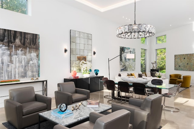 common area featuring a towering ceiling and recessed lighting