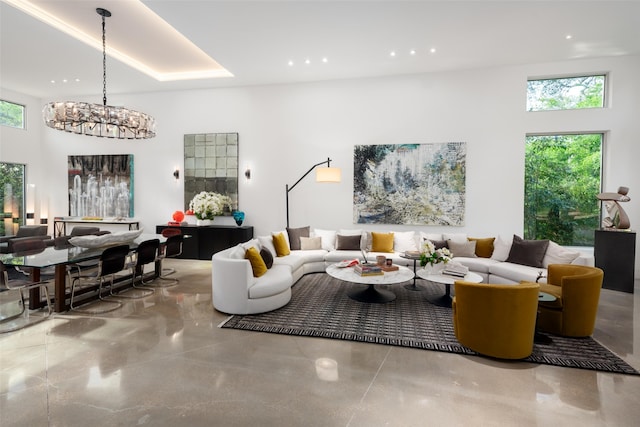 living room with a chandelier and recessed lighting