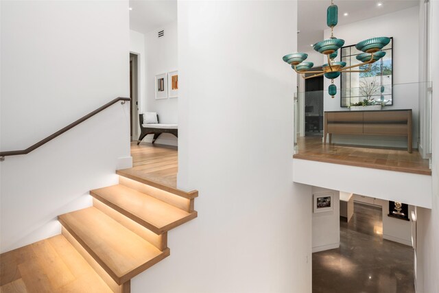 stairs featuring recessed lighting