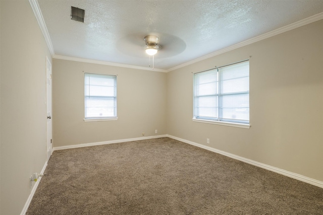 204 E 2nd St, Quinlan, TX 75474 - unfurnished room featuring ceiling fan, healthy amount of natural light, carpet, crown molding, and a textured ceiling