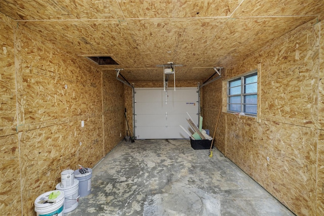 204 E 2nd St, Quinlan, TX 75474 - garage with a garage door opener
