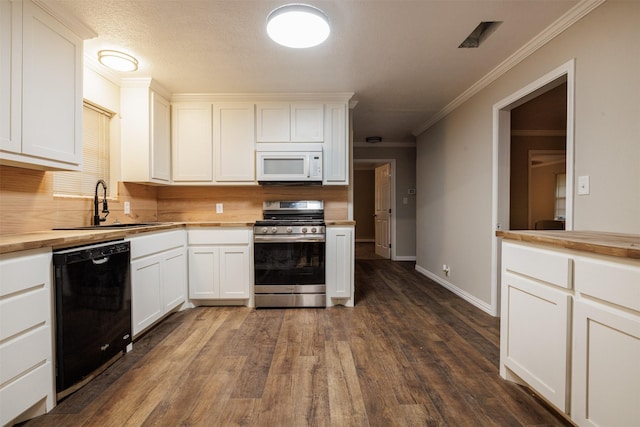 204 E 2nd St, Quinlan, TX 75474 - kitchen featuring stainless steel range, white microwave, dishwasher, a sink, and wooden counters